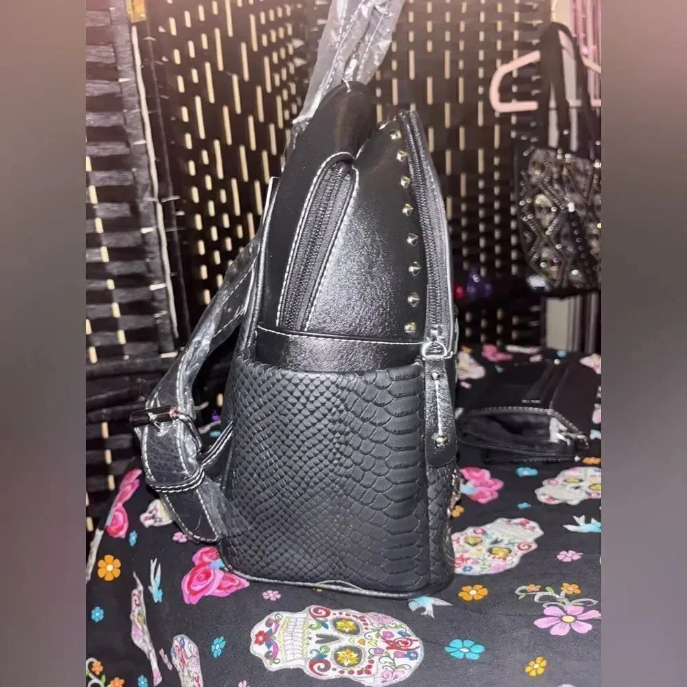 Edgy Backpack with Studded Skull Design